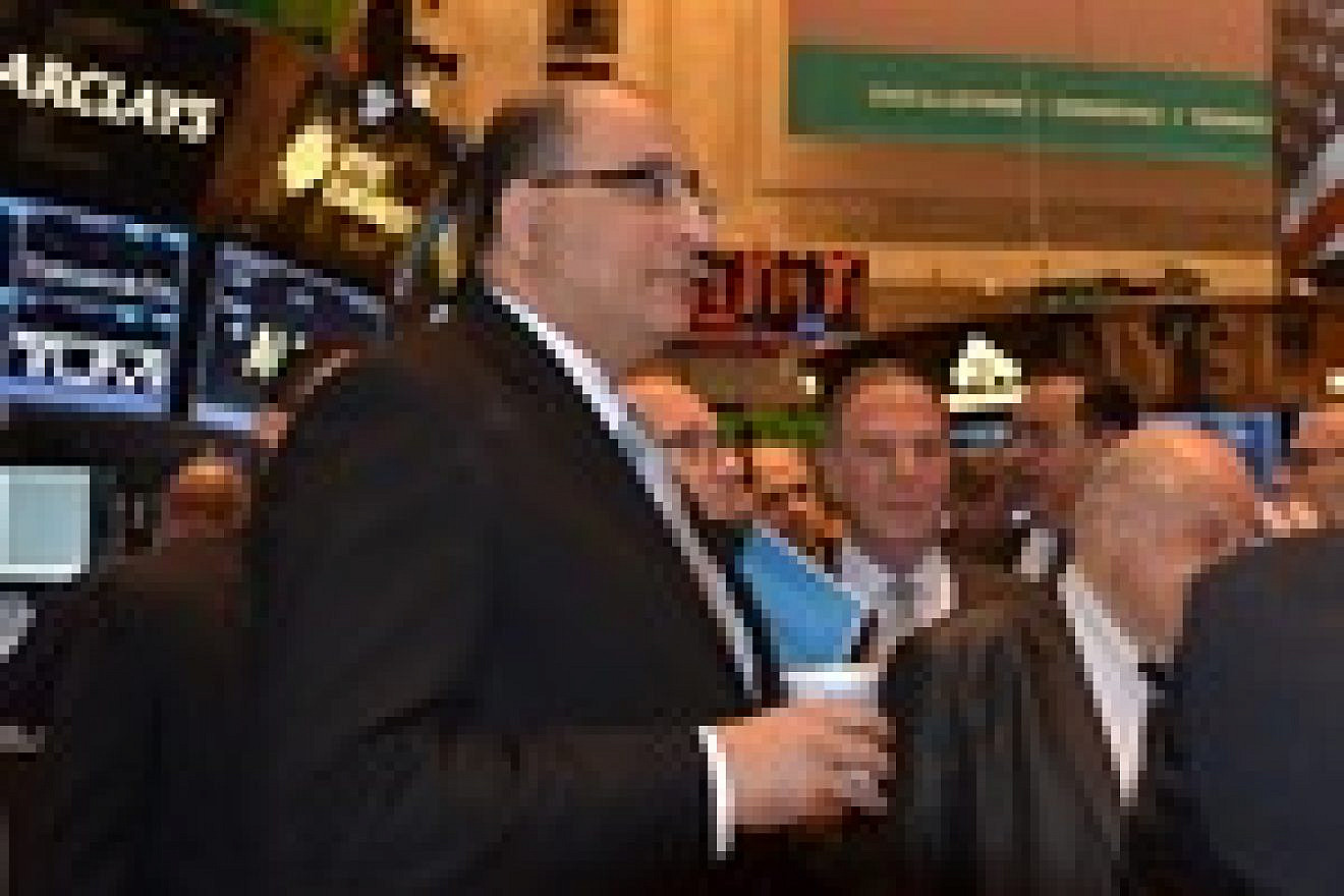 Click photo to download. Caption: Ido Aharoni, consul general of Israel in New York, at the New York Stock Exchange's "Israel Day" Tuesday. Credit: Maxine Dovere.