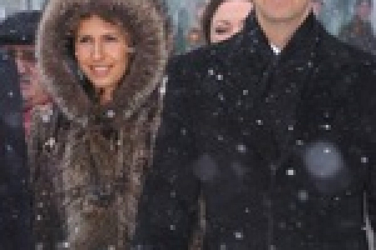 Syrian President Bashar Assad and his wife, Asma, in Moscow. Amid reports of Syria's chemical weapons arsenal falling within Hezbollah's reach, Assad reportedly remains "calm," perhaps due to Russia's deployment of a sizable naval force for an exercise off the Syrian coast. Credit: Rakkar/Wikimedia Commons.