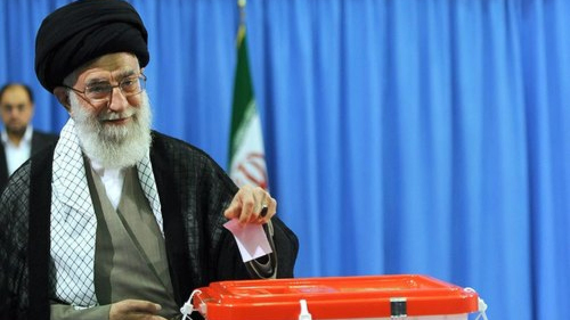 Supreme Leader Ayatollah Ali Khamenei casts his vote in Iran's 2013 presidential election. Credit: Mohammad Sadegh Heydari via Wikimedia Commons.