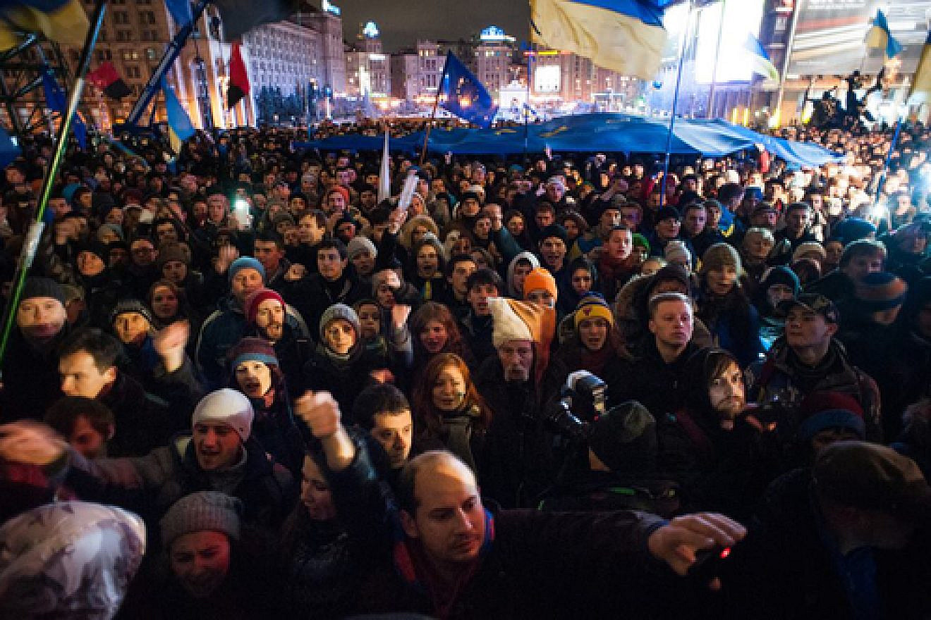 A  “Euromaidan” protest on Nov. 27, 2013 in Kiev, Ukraine. Due to the ongoing protests, which began over Ukrainian President Viktor Yanukovych’s decision to freeze plans to join a free trade agreement with the European Union, some Ukrainian-Jewish leaders canceled events out of fear that Jews may be targeted. Credit: Mstyslav Chernov via Wikimedia Commons.