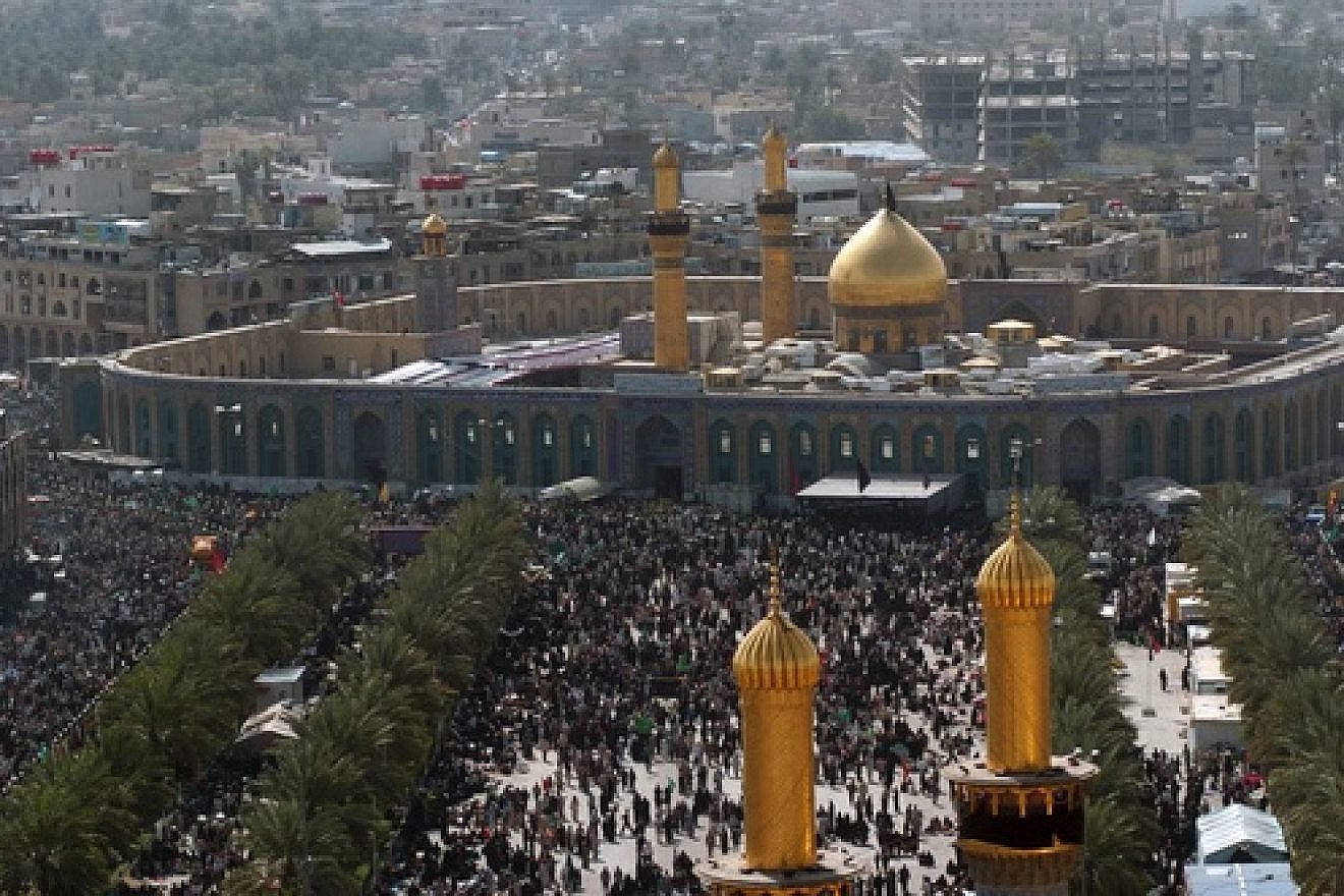 Shi’a Muslims gather around the Husayn mosque in Karbala, Iraq, after making a pilgrimage on foot during Arba'een, a 40-day period that commemorates the killing of Hussein ibn Ali, grandson of the Prophet Muhammad, and 72 of his followers at the Battle of Karbala in the year 680 B.C. That battle is seen as a source of the ongoing battle between Sunni and Shi’a Islam. Credit: SFC Larry E. Johns, USA, via Wikimedia Commons.