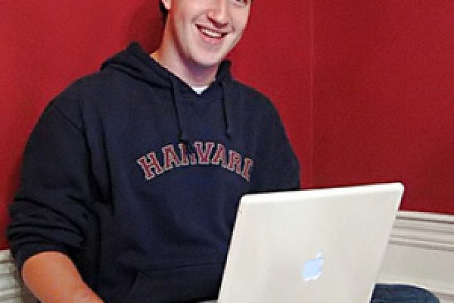 Facebook founder Mark Zuckerberg with his laptop. Credit: Wikimedia Commons.