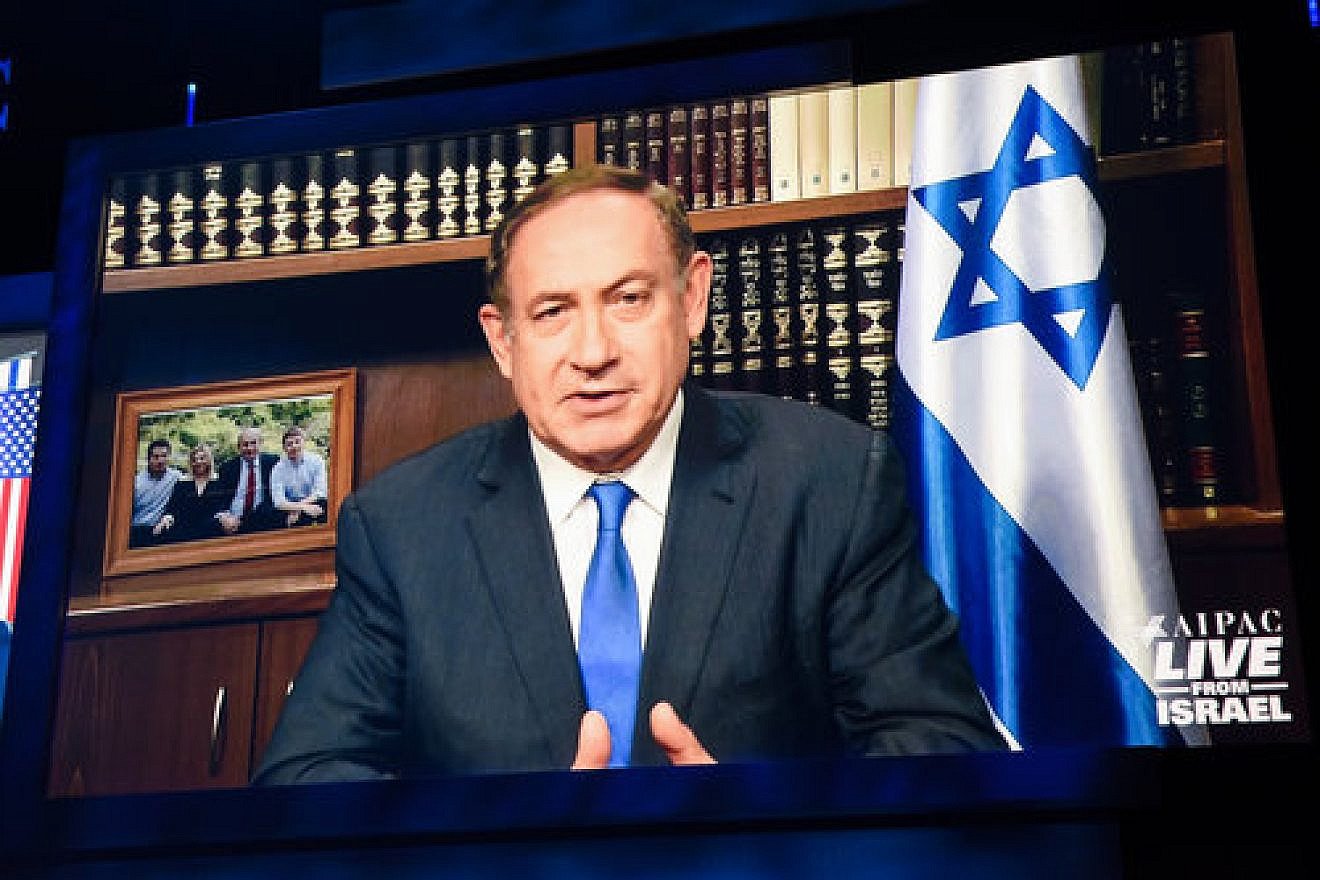 Prime Minister Benjamin Netanyahu, pictured here addressing the 2017 AIPAC policy conference via satellite, said the common dangers faced by Israel and its Arab neighbors present a “rare opportunity” to build a more peaceful future in the Middle East. Credit: AIPAC.