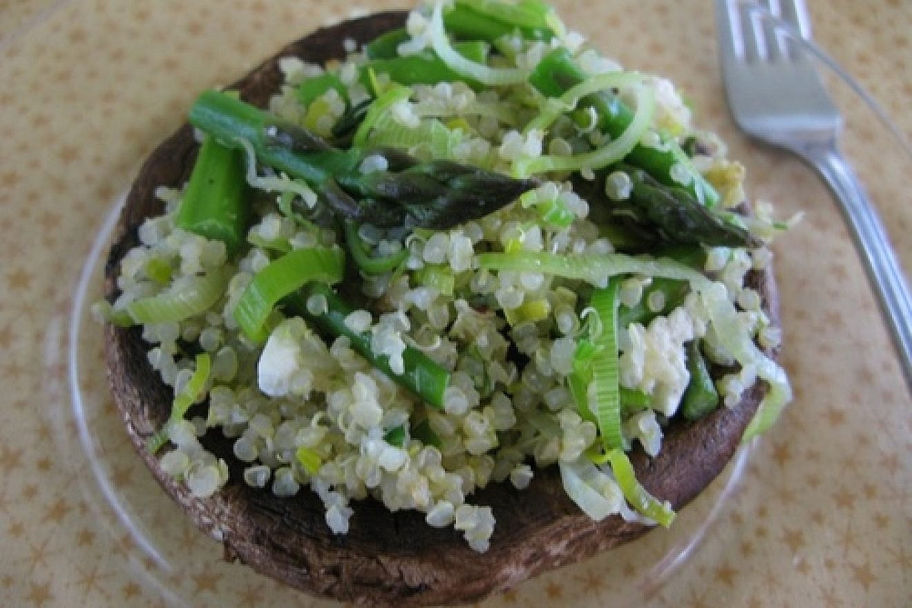 Quinoa pilaf with asparagus and leeks in a portobello mushroom. Credit: Mollie Katzen.