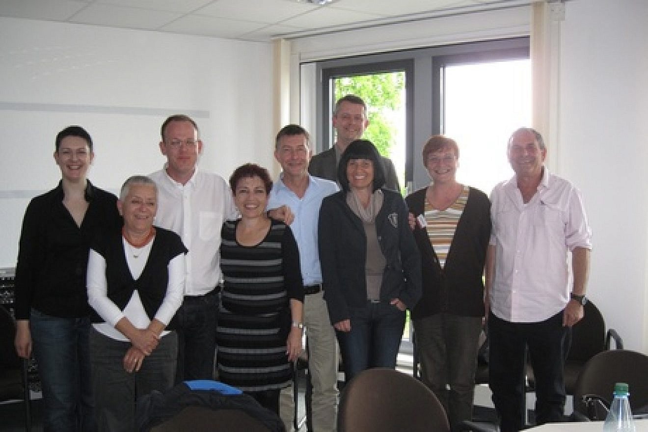 Pictured in Leipzig, Germany, are members of the Israeli team that partnered with Germany to assess how each country portrays the other’s history in school textbooks, for ages 12-18, and to make recommendations to improve future textbooks. Third from right, in back, is Dirk Sawdowski, chairman of the German-Israeli Textbook Commission, and second from left, in back, is Dr. Arie Kizel, the chairman coordinating the Israeli team. Credit: Courtesy Dr. Arie Kizel.