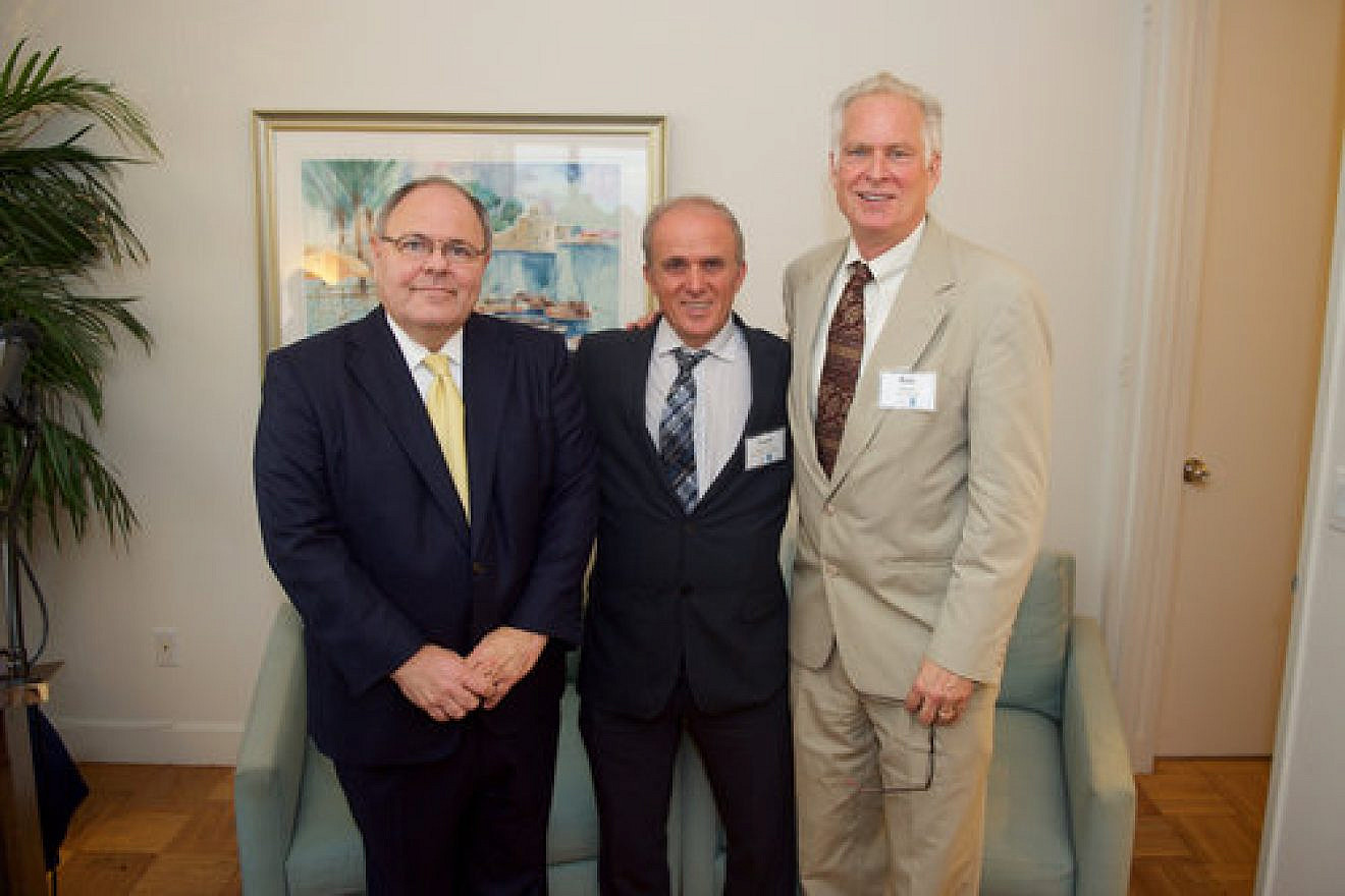 From left: Consul General of Israel in New York Dani Dayan, the Weizmann Institute’s Professor Yosef Yarden and Israel Cancer Research Fund President Rob Densen at the consul general’s residence. Credit: Perry Bindelglass.