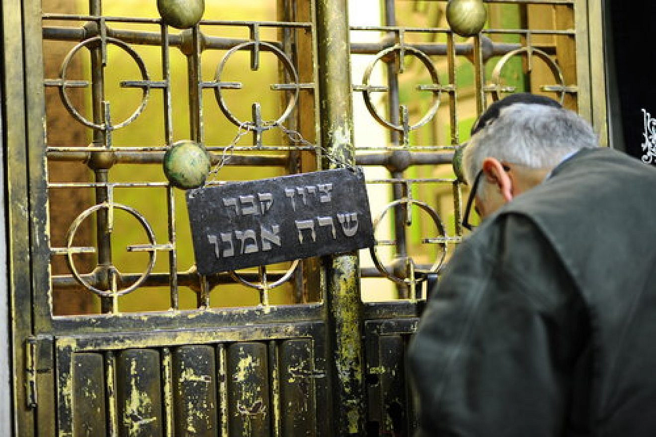 A Jewish man prays at the tomb of the biblical matriarch Sarah in Hebron’s Cave of the Patriarchs and Matriarchs on Nov. 25, 2016. Credit: Mendy Hechtman/Flash90.