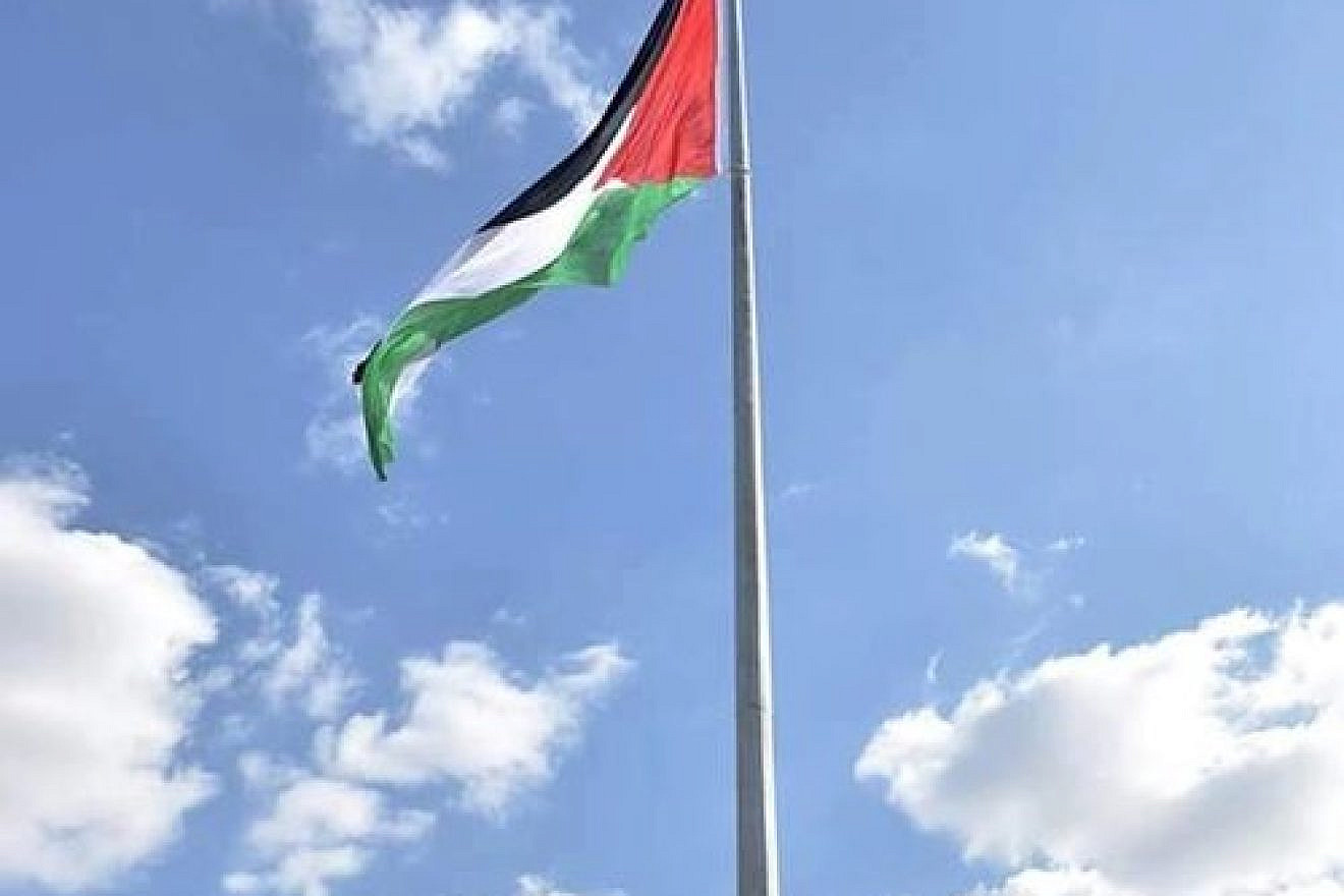 The Palestinian flag on a flagpole. (Illustrative.) Credit: Wikimedia Commons.