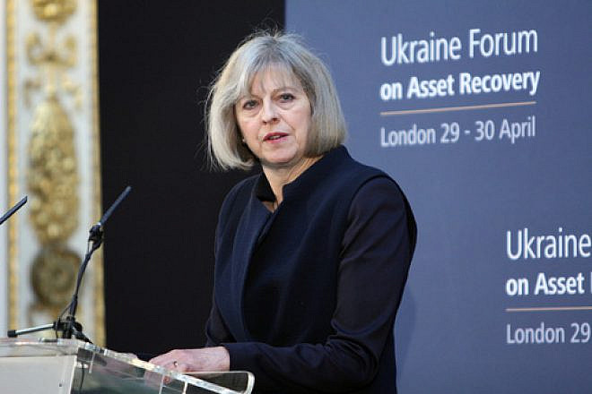 Former British Home Secretary Theresa May—who is now the U.K.'s prime minister—speaks at the Ukraine Forum on Asset Recovery in London on April 29, 2014. Credit: Foreign and Commonwealth Office via Wikimedia Commons.