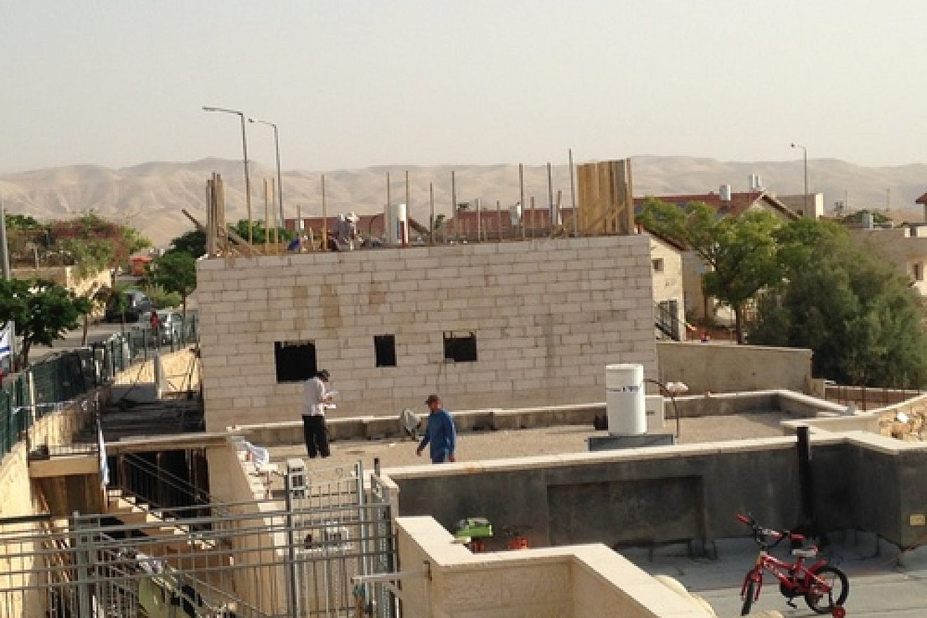 Caption: Uri Pilichowski, who lives in the Mitzpe Yericho settlement (pictured here) within Samaria's Binyamin region, says, "All along my street they are building. Jews are here to stay on their land forever." Credit: Uri Pilichowski.