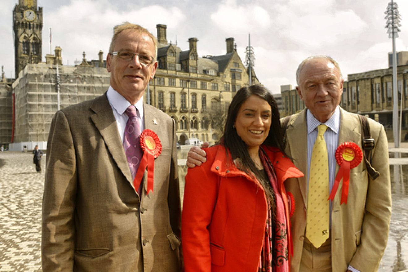 Pictured in the center is Naz Shah, who was suspended from the United Kingdom's Labour Party over a Facebook post in which she suggested the "relocation" of Israel. At right is Labour member and former London mayor Ken Livingstone, who was also suspended from the party for saying that Hitler was a Zionist. Credit: Wikimedia Commons.