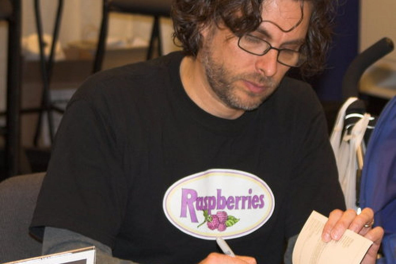 Michael Chabon at a book-signing. Credit: Charlie Reiman via Wikimedia Commons.