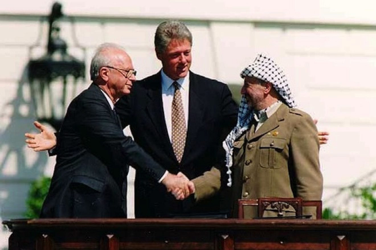 From left: Israeli Prime Minister Yitzhak Rabin, U.S. President Bill Clinton and Palestine Liberation Organization head Yasser Arafat at the signing of the Oslo Accords on Sept. 13, 1993. Credit: Vince Musi/The White House.
