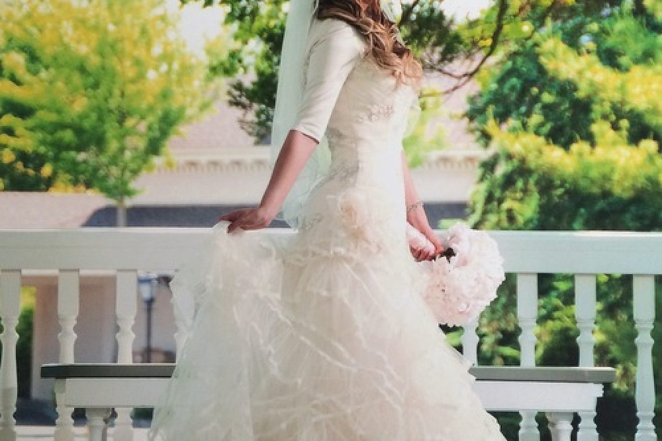 One of Fashion-Isha blogger Sharon Langert's favorite looks for an Orthodox-Jewish bride, from her recent post titled “Wedding Wednesday: The Real Wedding Dresses of the Frum and Fabulous.” Credit: Morris Antebi Photography.