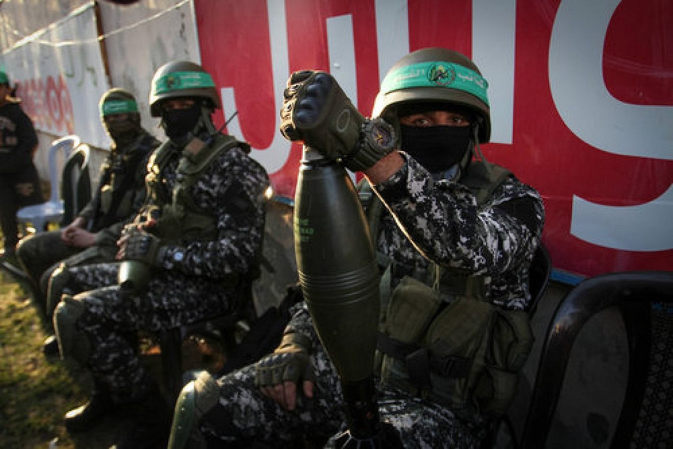 Hamas members take part in a rally marking the Palestinian terror group’s 29th anniversary in Gaza on Dec.16, 2016. Credit: Abed Rahim Khatib/Flash90.