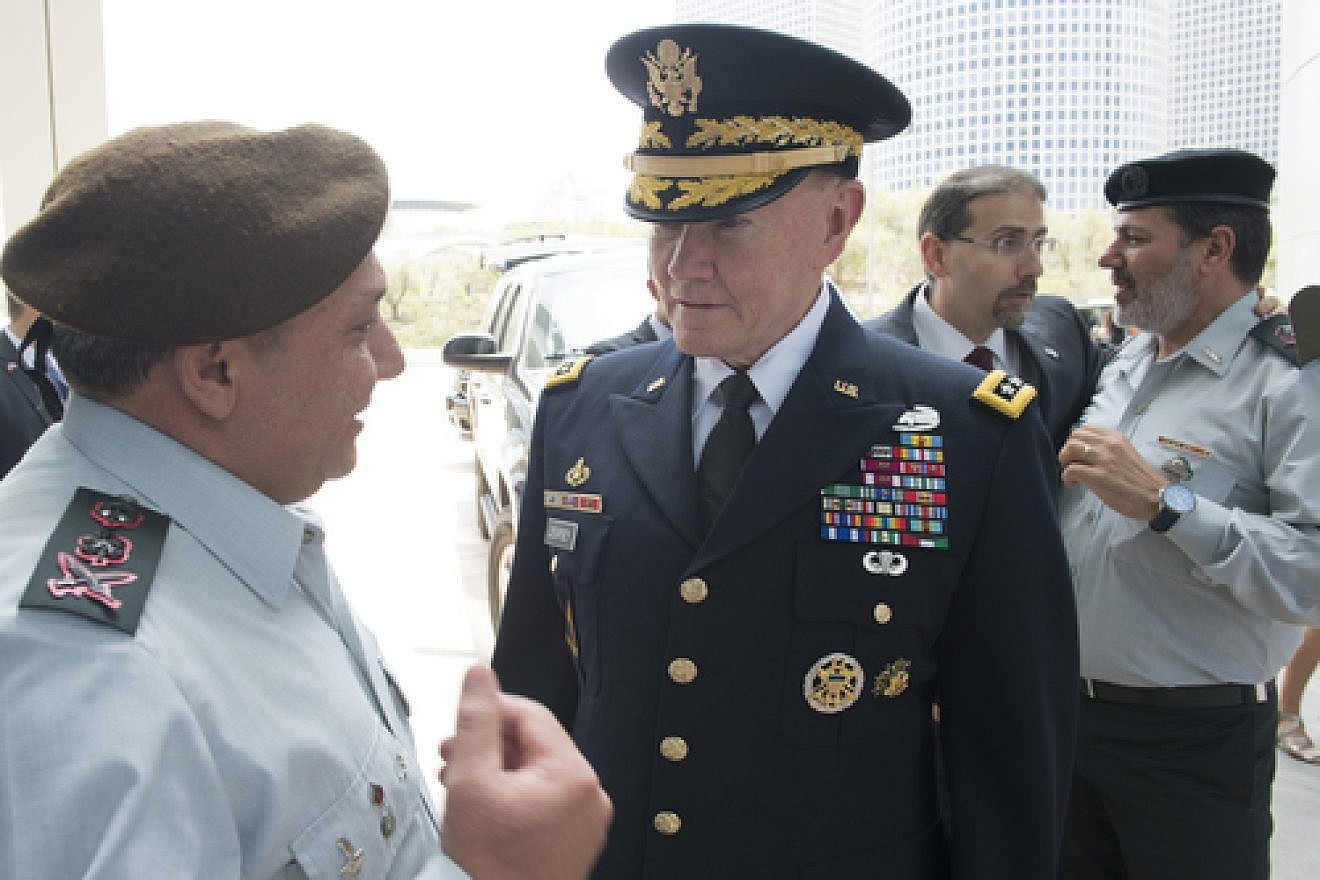 Israel Defense Forces (IDF) Chief of Staff Lt. Gen. Gadi Eizenkot (far left) speaks with Gen. Martin E. Dempsey (center), chairman of the U.S. Joint Chiefs of Staff, in Tel Aviv on June 9, 2015. Bolstering Israeli-American defense ties is among the principles mentioned in a new document released by Eizenkot on Aug. 13. The release marked the first time in 60 years that the IDF has made its official strategy publicly available. Credit: DOD photo by D. Myles Cullen/Released.
