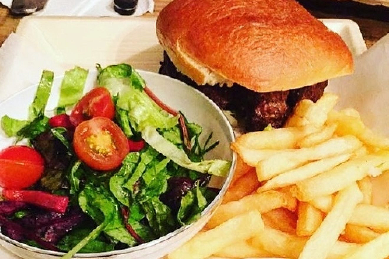 Eliana Rudee's Passover fare in Israel, including a hamburger on a potato-bread bun. Credit: Eliana Rudee.