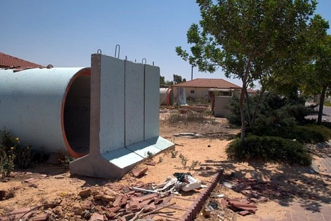 Click photo to download. Caption: A sewer pipe bomb shelter in the farming village of Yevul, alongside the Gaza Strip. Credit: B. Davidson.