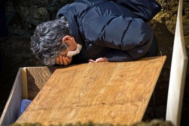 A man is grief-stricken after the earthquake and tsunamis devastate Japan in March. Rabbi Kushner guides the way to facing God after suffering tragedy and the loss of loved ones. Credit: Douglas Sprott.