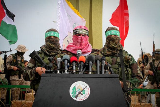 Abu Ubaida (center), a spokesman for Hamas’s military wing, speaks in the southern Gaza town of Rafah on Jan. 31, 2017. Credit: Abed Rahim Khatib/Flash90.