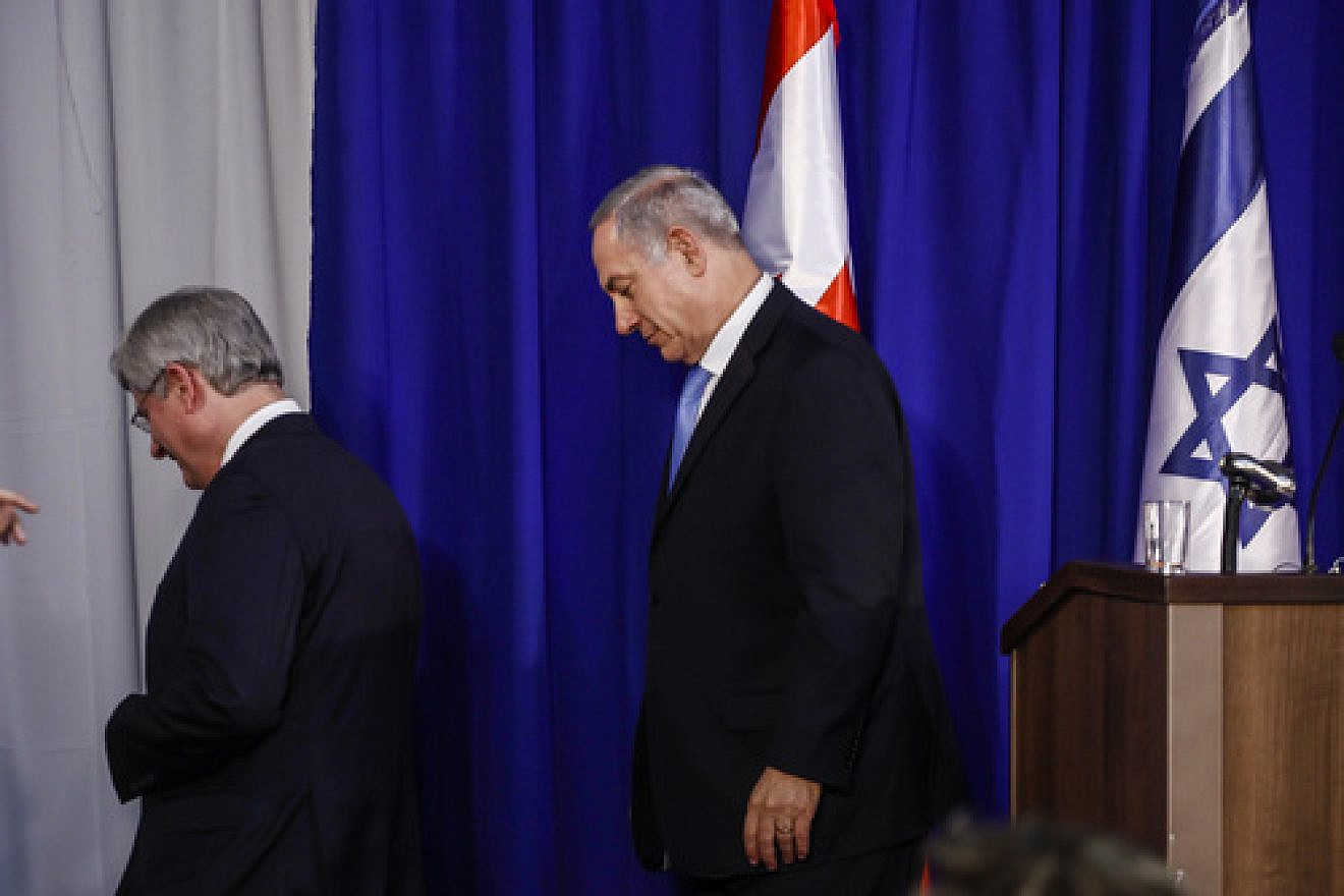 Click photo to download. Caption: Canadian Prime Minister Stephen Harper (left) and Israeli Prime Minister Benjamin Netanyahu exit a joint press conference in Jerusalem in January 2014. In Canada, Harper will now exit his prime minister post as well. Credit: Flash90.