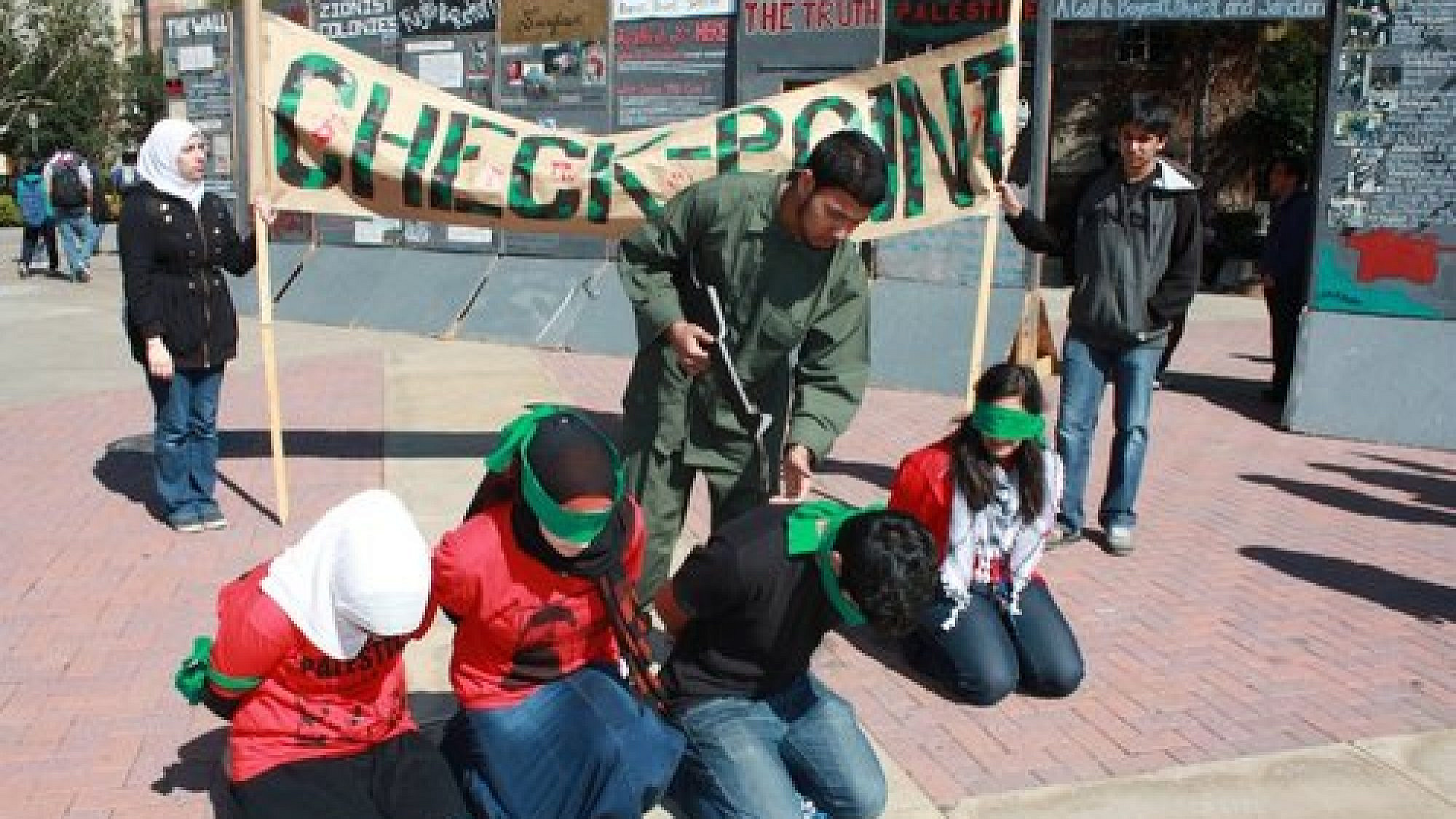 A mock checkpoint set up during “Israeli Apartheid Week,” an annual global anti-Israel initiative, at the University of California, Los Angeles. Credit: AMCHA Initiative.