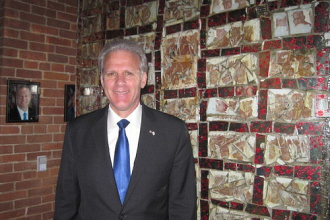 Ambassdor Michael Oren in front of artwork titled "Shalom" at the Banneker Douglass Museum of African American history in Annapolis, Md., with a photo of Maryland Gov. Martin O'Malley in the background. Credit: Paul Foer.