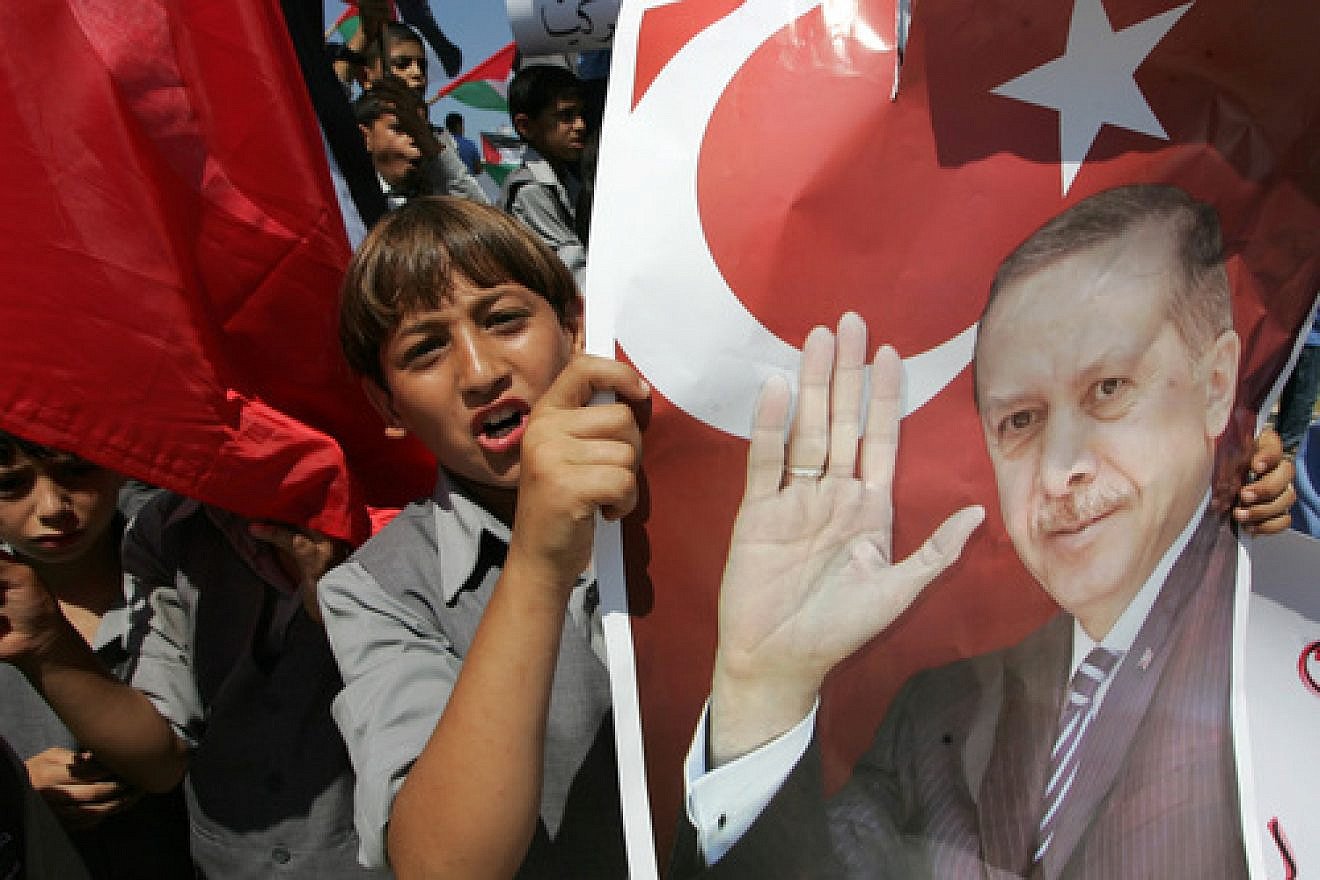 In Gaza City on Sept. 13, 2011, Palestinian students hold up pictures of then Turkish prime minister and now President Recep Tayyip Erdoğan during a rally that urged Erdogan to visit the Hamas-ruled Gaza Strip. Erdogan's pro-Palestinian and anti-Israel views have been increasingly on display in recent years. Credit: Abed Rahim Khatib/Flash 90.