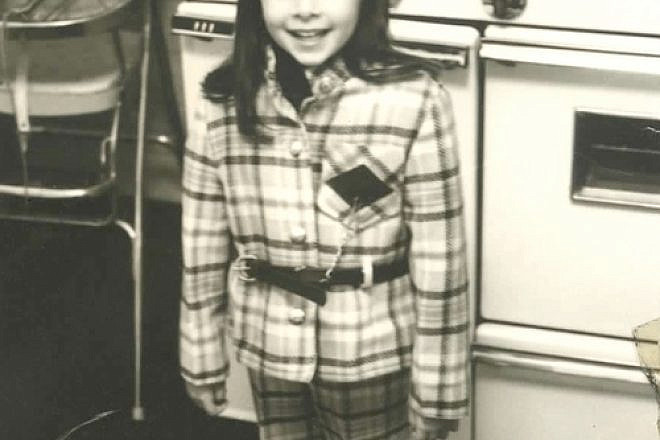 A young Dawn Lerman ready to cook with her grandmother, Beauty. Credit: Courtesy Dawn Lerman.