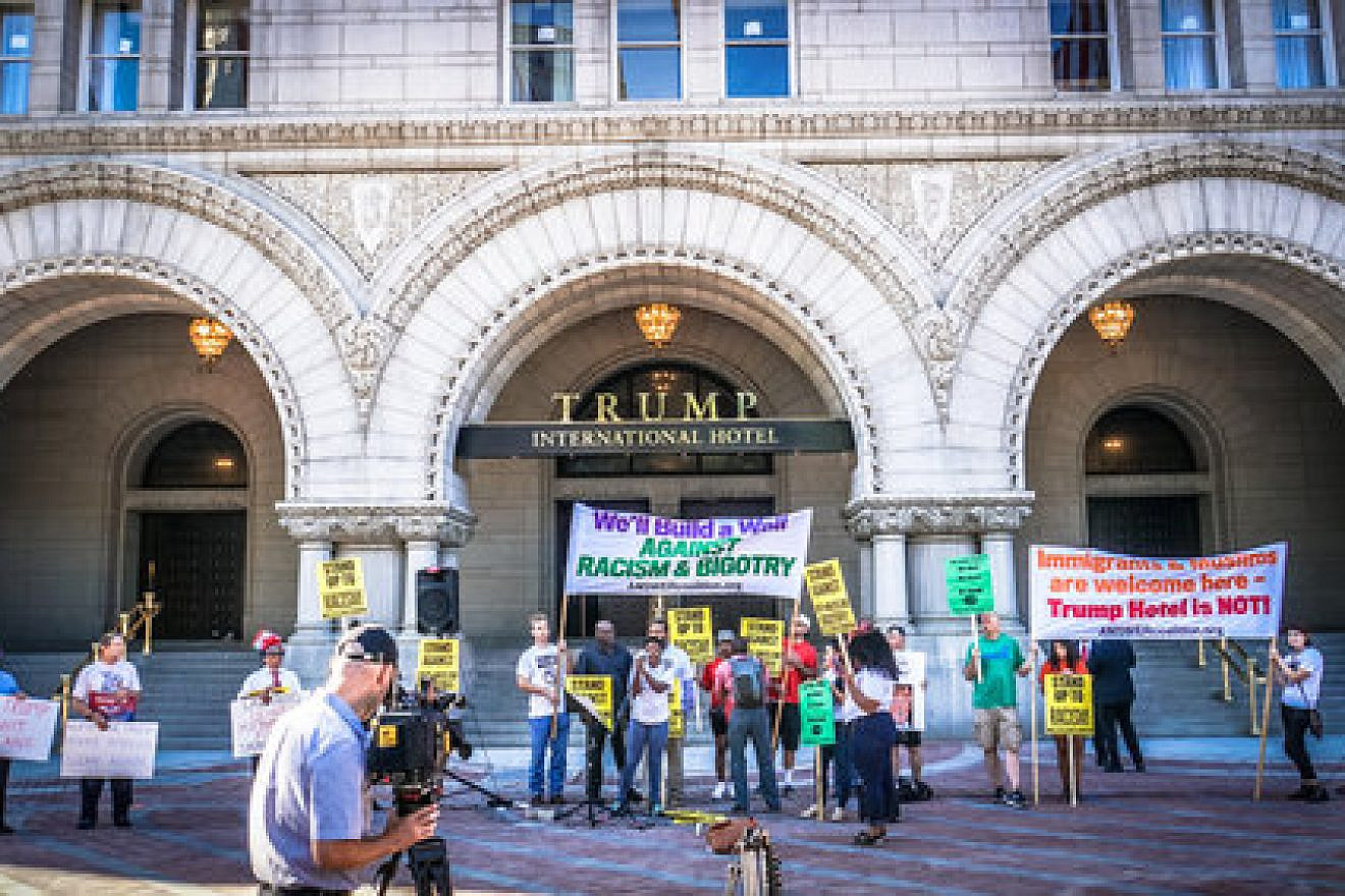A protest against then-presidential candidate Donald Trump outside the Trump International Hotel in Washington, DC, Sept. 12, 2016. Credit: Ted Eytan via Wikimedia Commons.