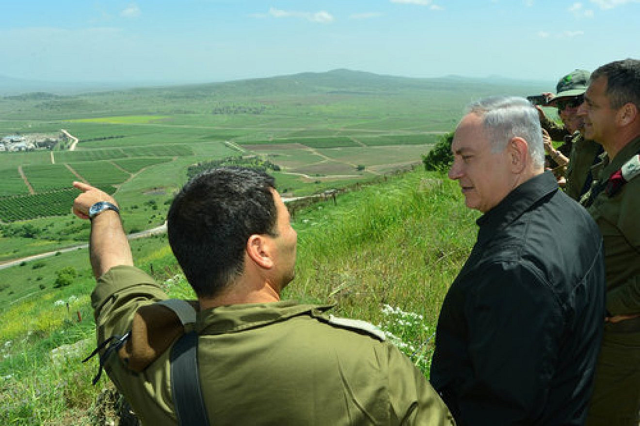 Israeli Prime Minister Benjamin Netanyahu is seen during a security and defense tour in the Golan Heights, near the Israeli border with Syria, in April 2016. Photo by Kobi Gideon/GPO.