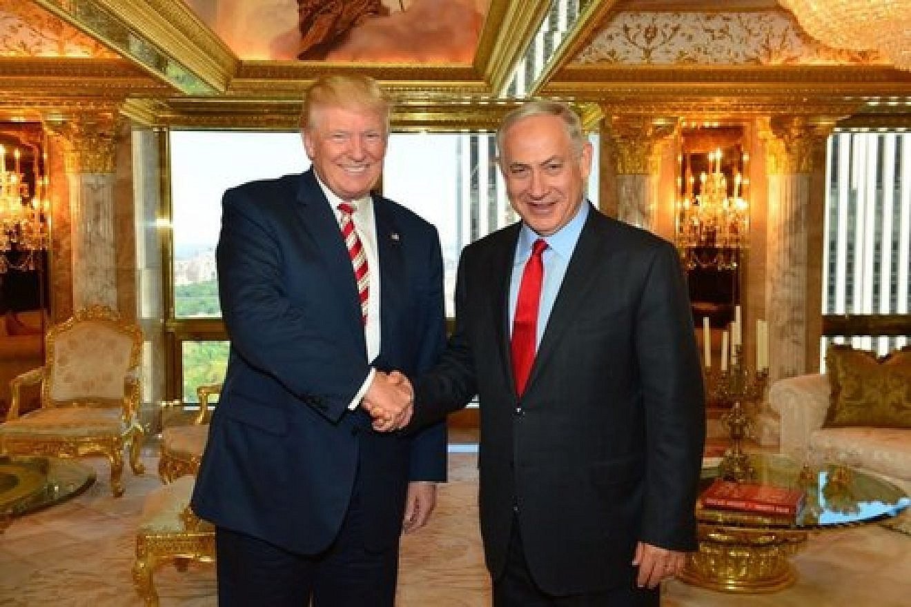 Donald Trump (left) shakes hands with Israeli Prime Minister Benjamin Netanyahu during their meeting at Trump Tower in New York City in September 2016. Credit: Kobi Gideon/GPO.