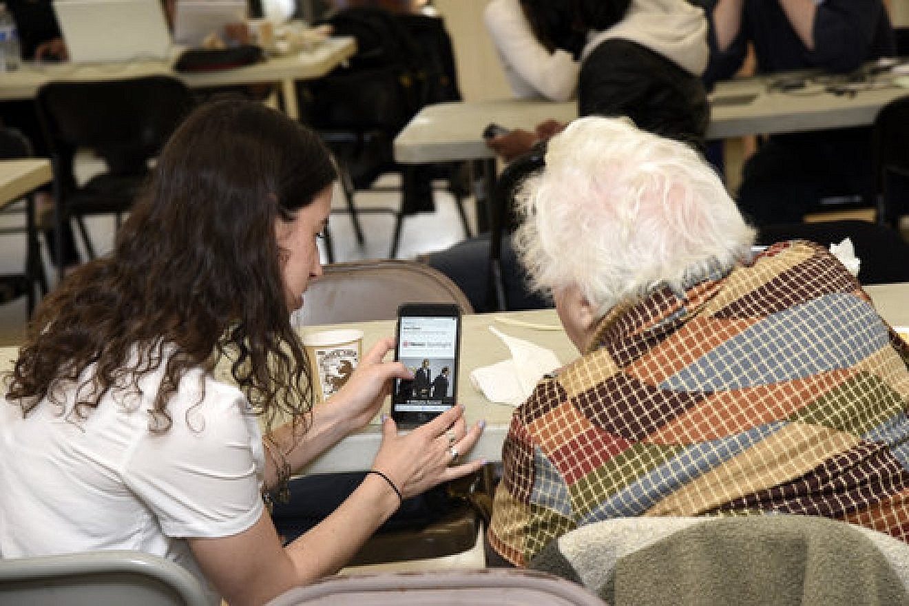 A picture that is included in “Smart Money,” a newly released study intended to help the Jewish community navigate the high-tech world. Credit: Lewis Kassel, courtesy of Moishe House.