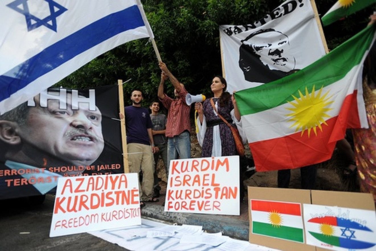 Israelis hold up placards, including a portrait of Turkey's Prime Minister Recep Tayyip Erdogan labeled wanted, during an anti-Turkish protest outside the Turkish embassy in Tel Aviv on July 8, 2010. Credit: Gili Yaari/Flash 90.