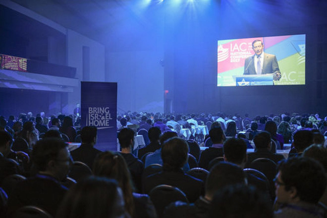 Attendees of the Israeli-American Council's (IAC) national conference listen to remarks by Adam Milstein, IAC's chairman, earlier this month in Washington, D.C. Credit: Alycia Kravitz.