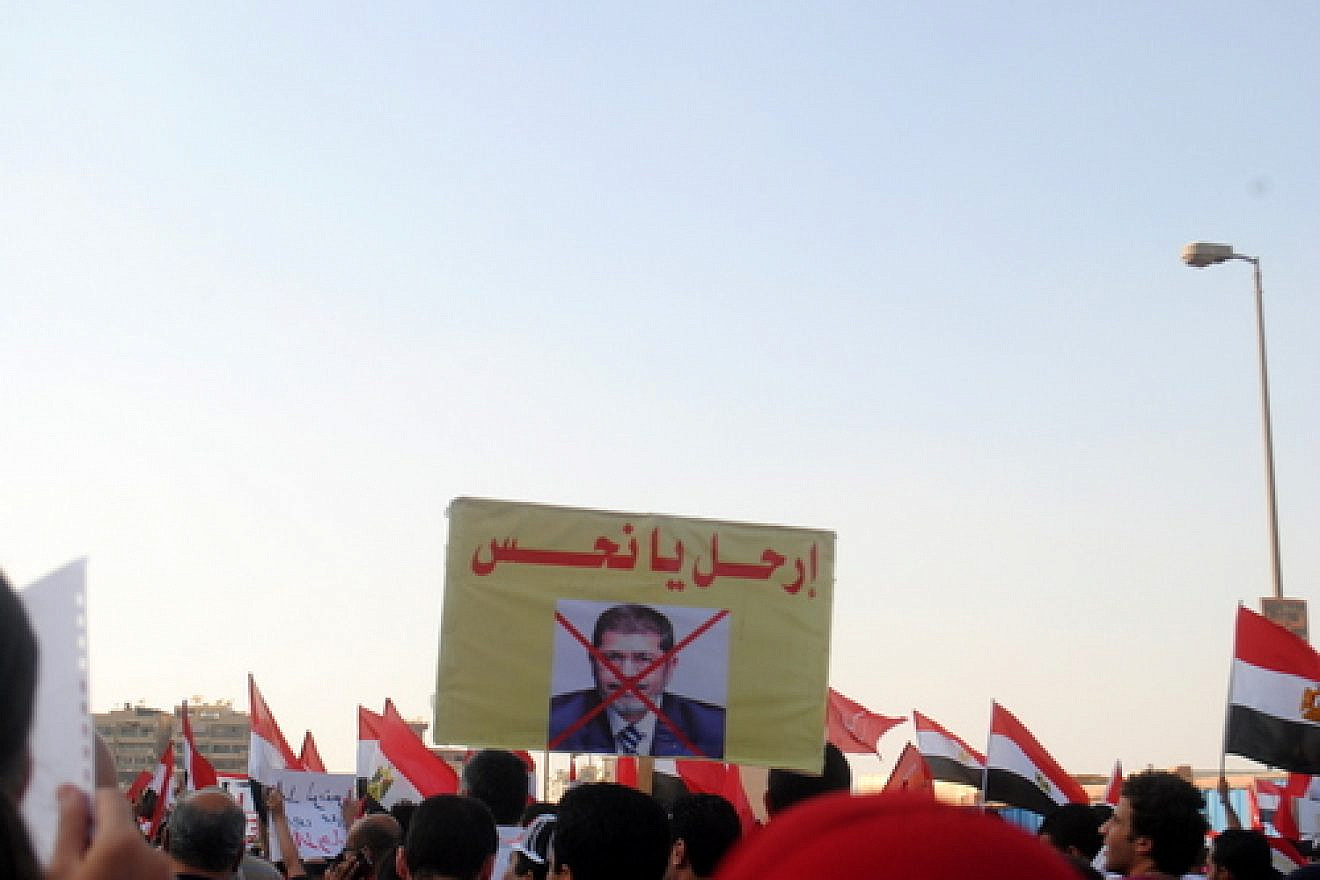 Click photo to download. Caption: A protest against now former-president Mohamed Morsi in Egypt on June 28, 2013. Credit: Lilian Wagdy via Wikimedia Commons.