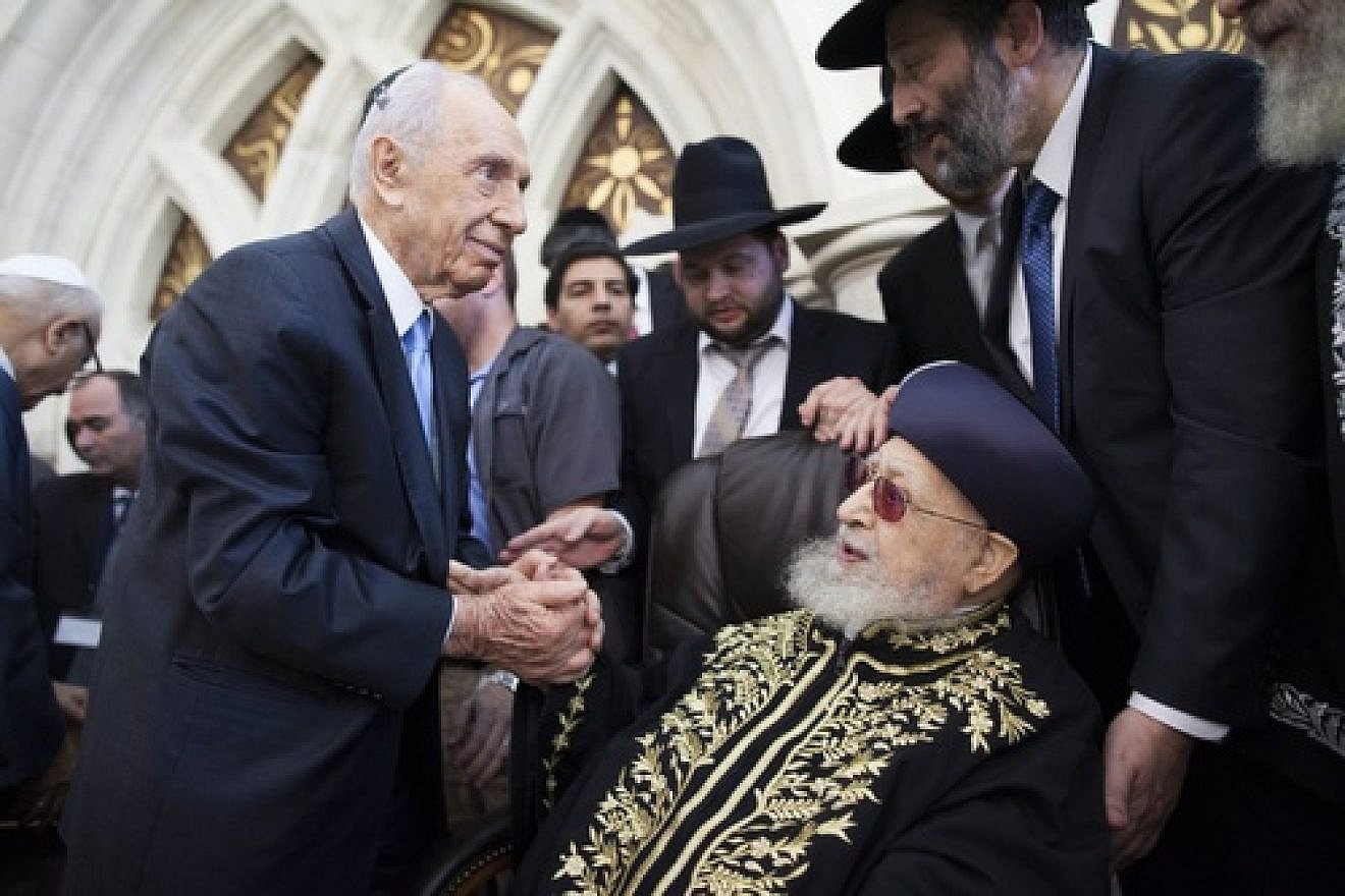 Click photo to download. Caption: Shas spiritual leader Rabbi Ovadia Yosef shakes hands with Israeli President Shimon Peres at a Sept. 16 ceremony at the Rabban Yohanan Ben Zakai Synagogue in Jerusalem during which his son, Rabbi Yitzhak Yosef, officially became the Sephardi Chief Rabbi of Israel. Photo by Yonatan Sindel/Flash90.