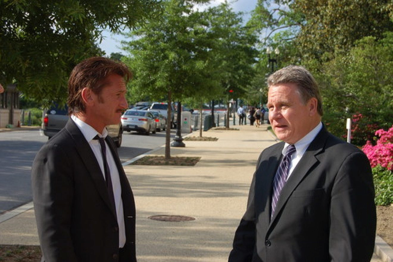 Click photo to download. Caption: Actor Sean Penn (left) with U.S. Rep. Chris Smith (R-NJ) after Penn testified on the case of Jewish prisoner Jacob Ostreicher at a May 20, 2013 congressional hearing organized by Smith. Credit: Office of U.S. Rep. Chris Smith.