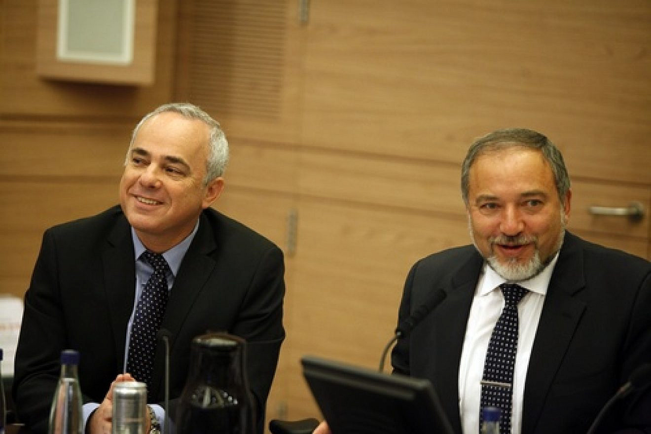 Yuval Steinitz (left), Israeli Minister of International Relations and Strategic Affairs, and Avigdor Lieberman at a Foreign Affairs and Defence committee meeting in the Israeli Parliament in Jerusalem on May 20, 2013. Steinitz on Monday said  There is a “real possibility” that Syrian President Bashar al-Assad “could survive Syria’s civil war and even prevail in it.” Photo by Flash90.
