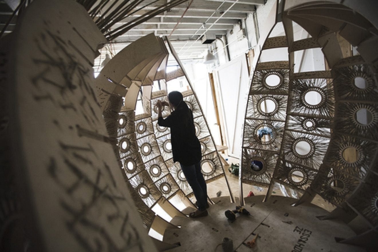 Inside the construction of "Fractured Bubble," the "people's choice" winner at the 2010 Sukkah City competition. Credit: Christopher Farber.