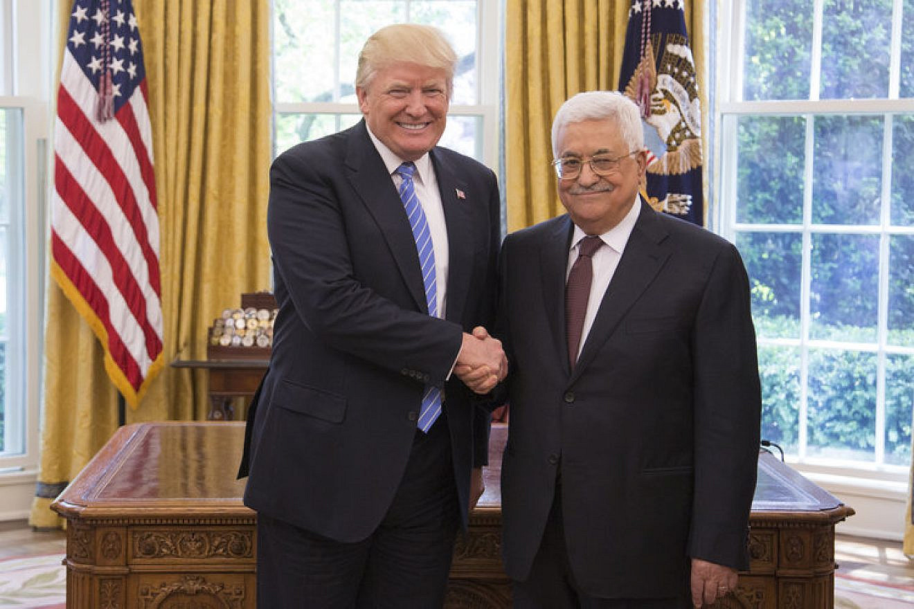 U.S. President Donald Trump (left) and Palestinian Authority President Mahmoud Abbas shake hands in the Oval Office on May 3, 2017. Credit: White House Photo by Shealah Craighead.