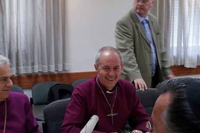 Click photo to download. Caption: Justin Welby (sitting in center), the Archbishop of Canterbury, at a press conference at the Israeli Chief Rabbinate in Jerusalem during his visit to Israel on Thursday. Credit: Rachel Marder.