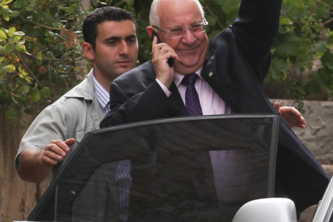 Click photo to download. Caption: Israeli president-elect Reuven Rivlin seen leaving his home in Jerusalem on June 11, a day after winning a vote for president held in the Israeli Knesset. Credit: Flash90.