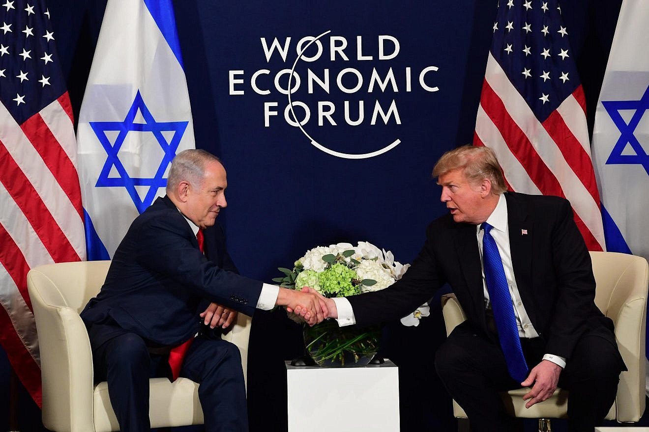Israeli Prime Minister Benjamin Netanyahu and President Donald Trump meet on Jan. 25 at the World Economic Forum in Davos, Switzerland. Credit: Amos Ben-Gershom/GPO.