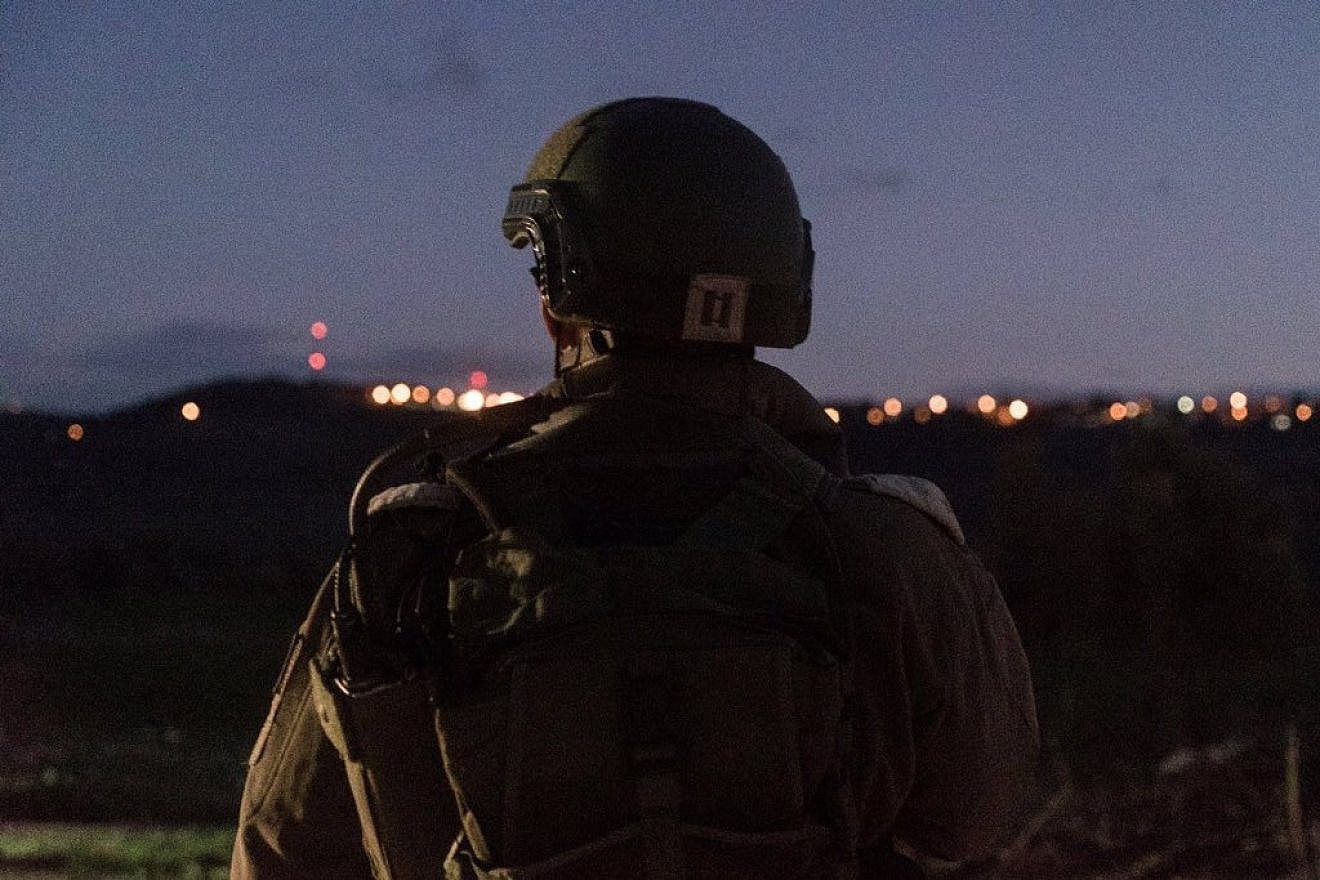 An IDF soldier who was part of Wednesday night's manhunt to apprehend suspects in the drive-by shooting terror attack that killed Rabbi Raziel Shevach. Credit: IDF via Twitter.