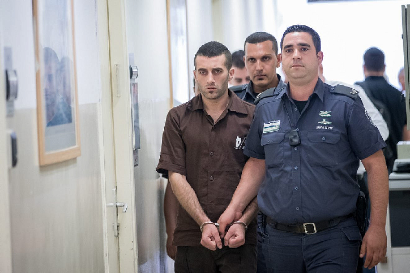 Muhammad Harouf, a Palestinian convicted of murdering Michal Halimi, is brought to the Jerusalem Magistrate's Court on Aug. 2, 2017. Photo by Yonatan Sindel/Flash90.