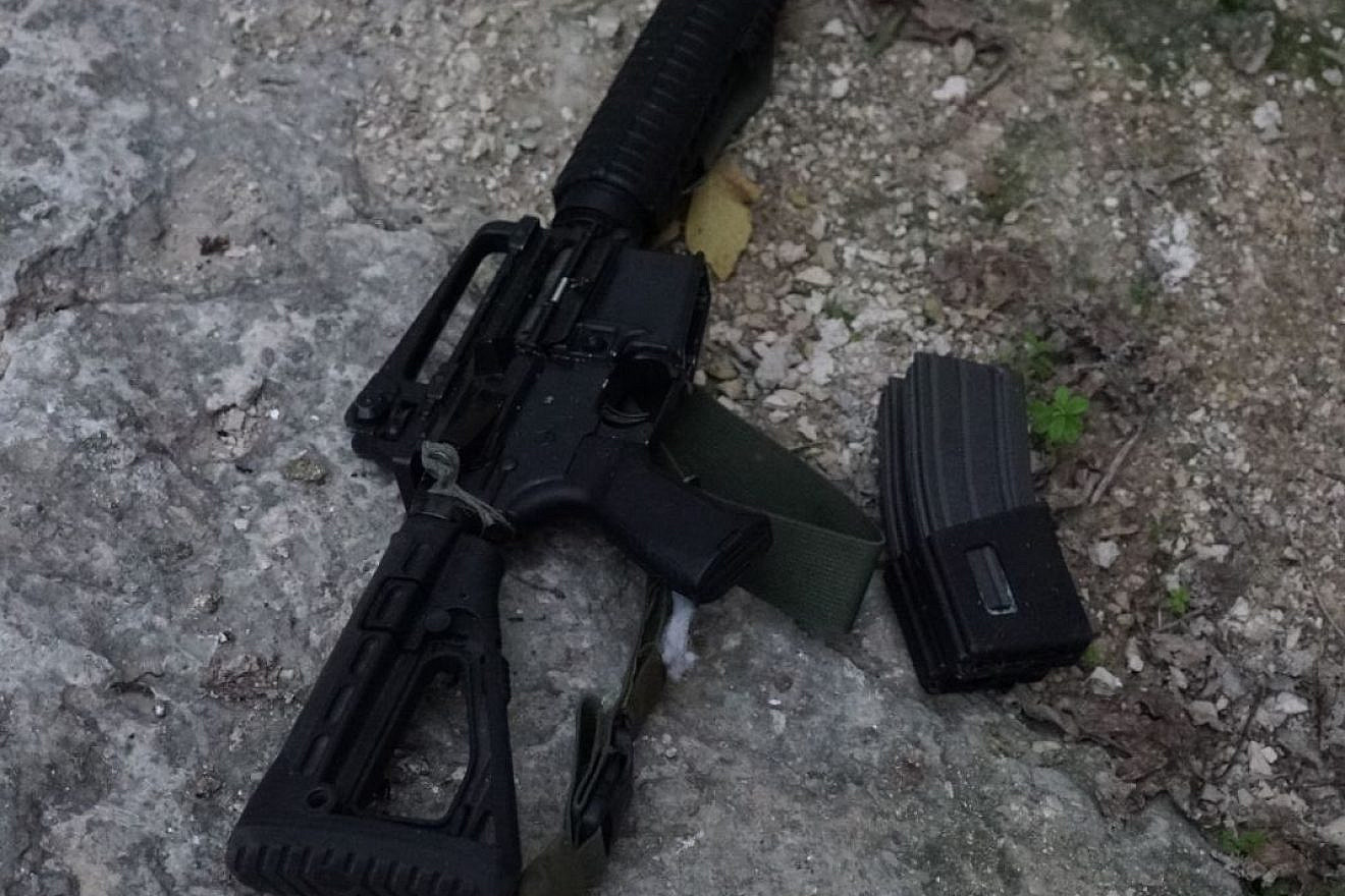 Weapons belonging to Ahmed Nassar Jarrar, the head of the Palestinian terror cell that on Jan. 9 murdered Israeli father of six and volunteer medic Rabbi Raziel Shevach. Credit: IDF via Twitter.
