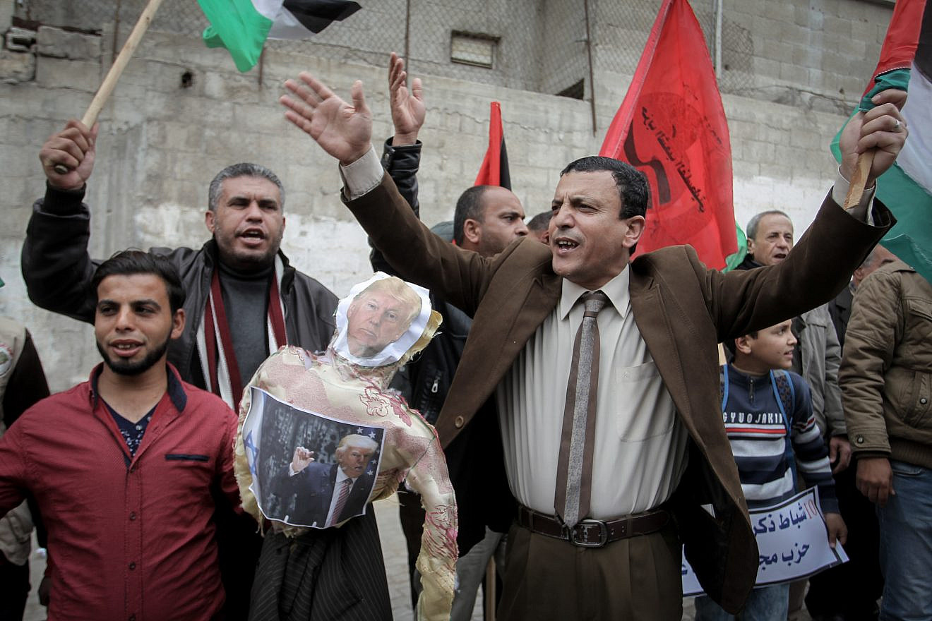 Palestinians protest against U.S. aid cuts outside the U.N. offices at the Khan Yunis refugee camp in the Gaza Strip on Feb. 11, 2018. Credit: Abed Rahim Khatib/Flash90.