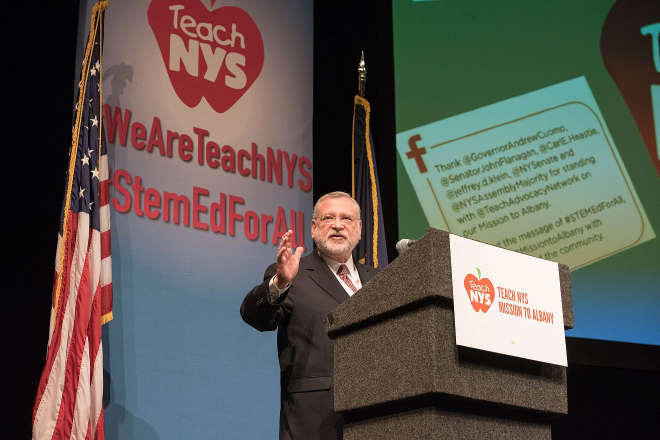 Allen Fagin, executive vice president of the Orthodox Union, addresses the crowd of students, parents and school officials in Albany, N.Y., to advocate for more private-school educational funding. Credit: Semeraro Photography.
