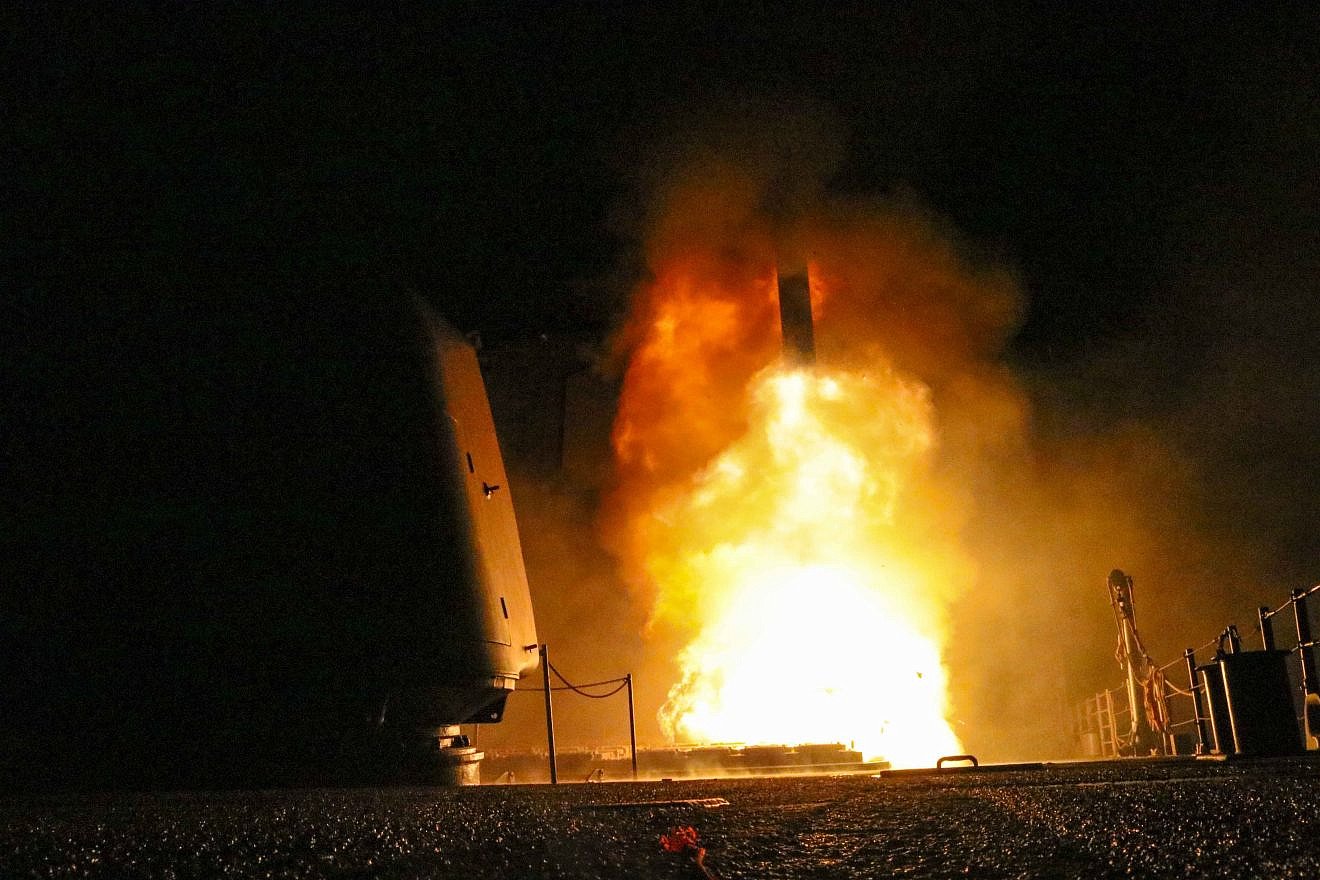 The “USS Monterey” guided missile-cruiser fires a Tomahawk missile in the U.S. 5th Fleet area of operations against Syria over its use of chemical weapons, April 13, 2018. Credit: Navy Photo by Lt. j.g Matthew Daniels.